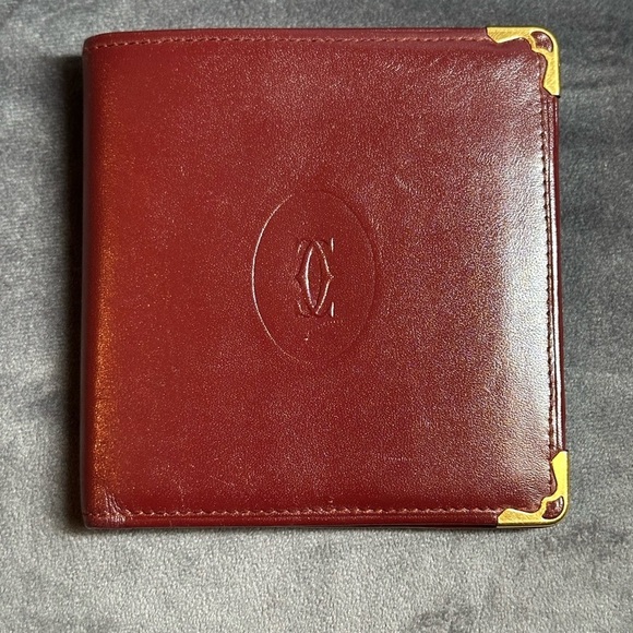 Cartier Other - EUC Cartier bifold, wallet Masteline Bordeaux Enamel Leather Authentic